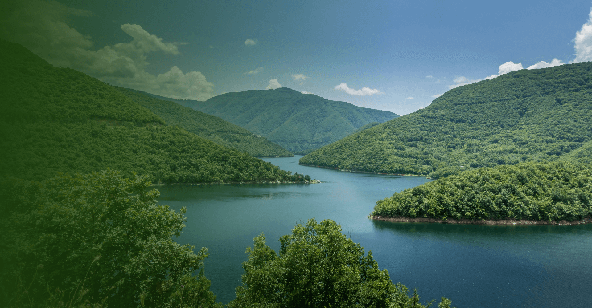 Landscape and water among green hills